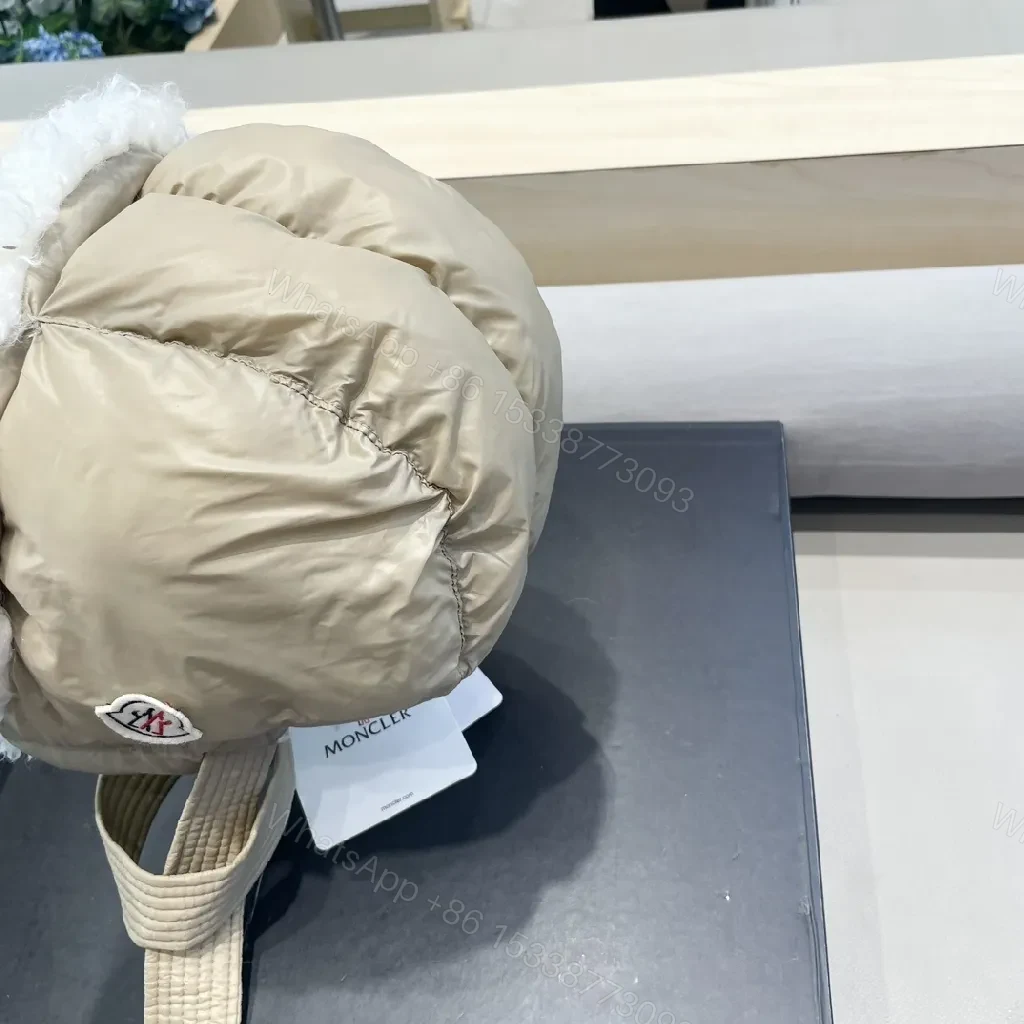 View 4 of Beige Padded Hat with Plush Lining – Luxury Cozy Detail
