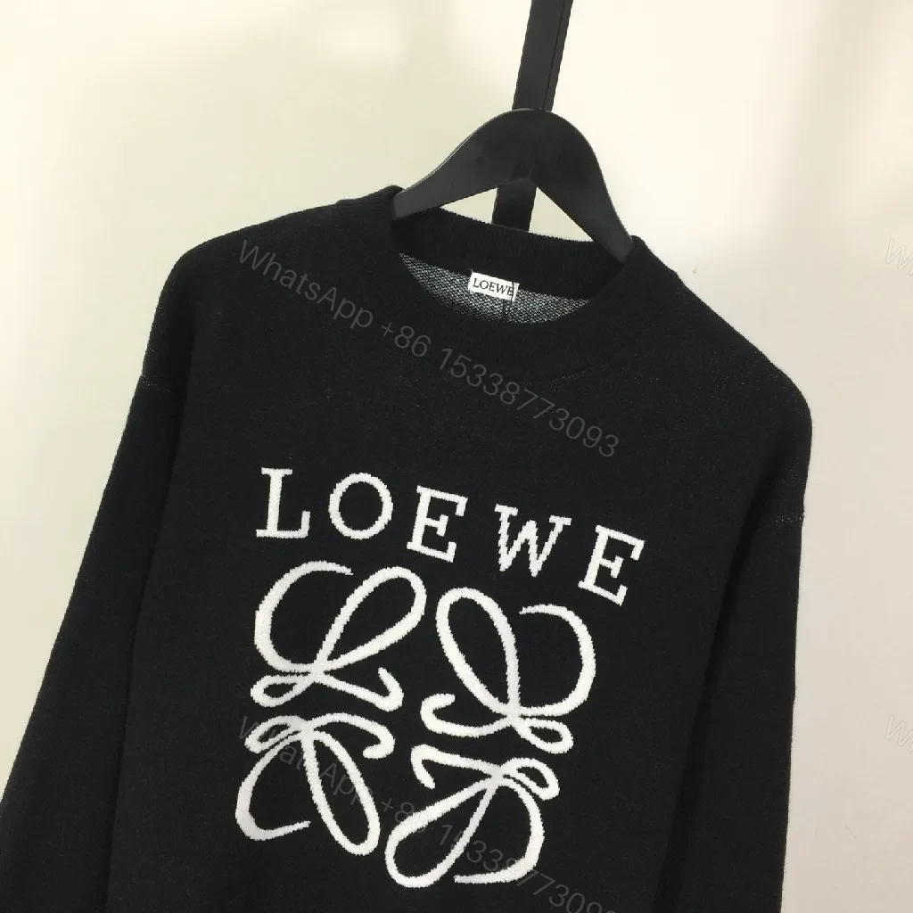 View 4 of Bold Logo Knit with Iconic Graphic Detailing — Modern Sophistication Knit