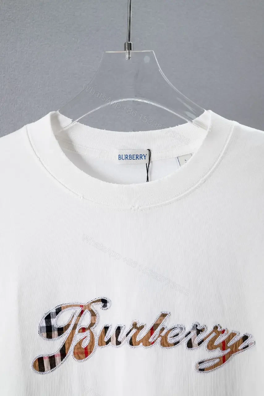 View 4 of White Embroidered Logo Oversized Tee Patch Hemfront Shirt