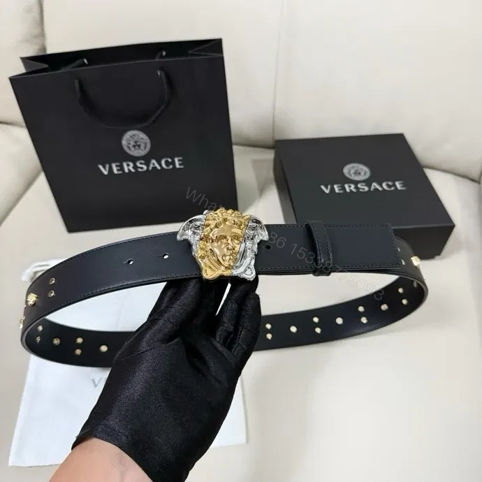 View 2 of Golden Medusa Buckle Belt — Black Leather, Two-Tone Luxury