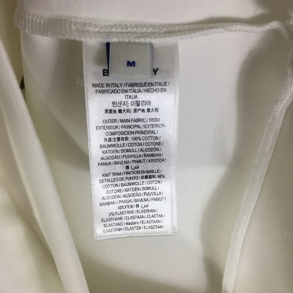 View 2 of Minimalist Off-White Hoodie with Subtle Logo Design
