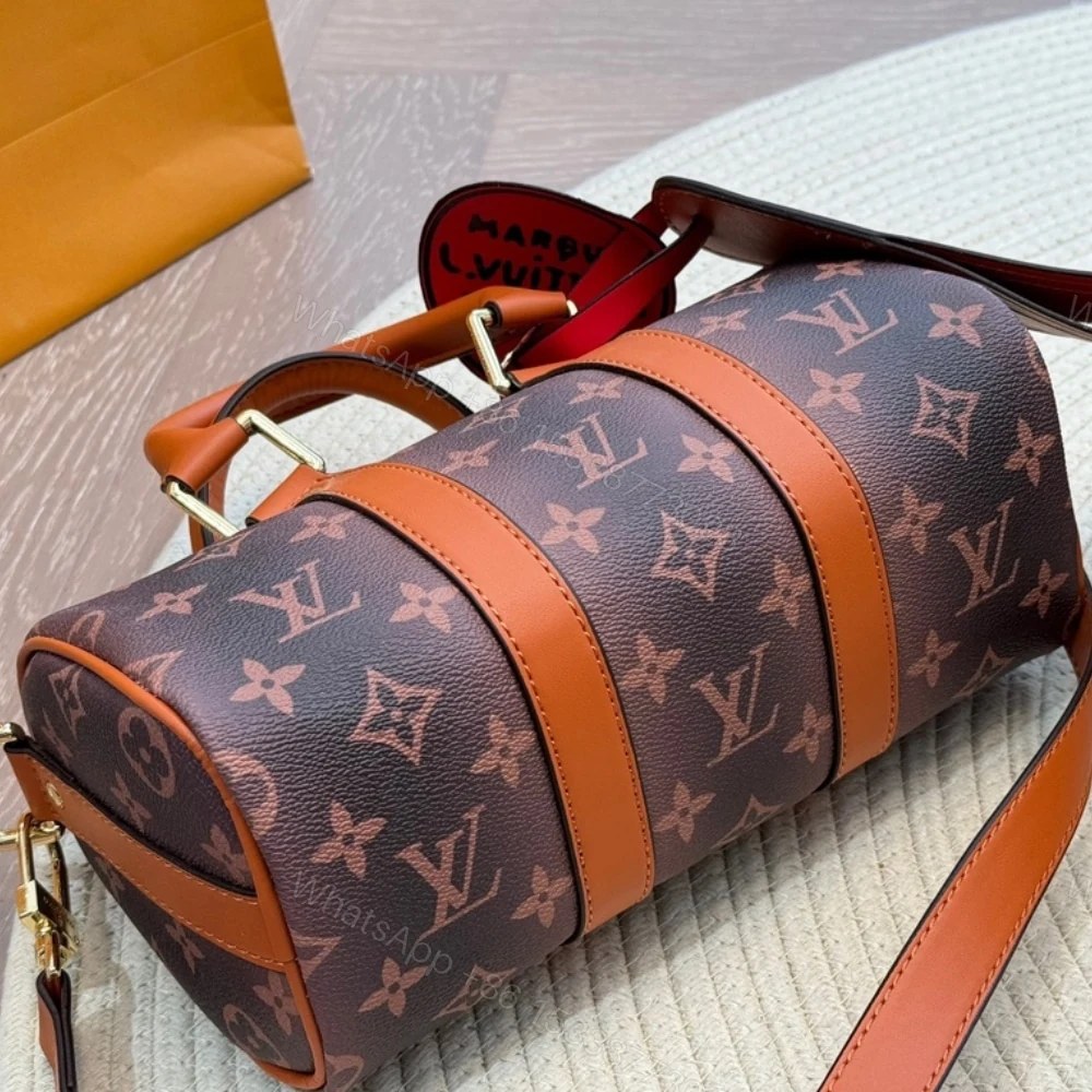 View 6 of Louis Vuitton Keepall Bandoulière 25 Monogram Dust Coated Canvas Brown 25Cm M11542