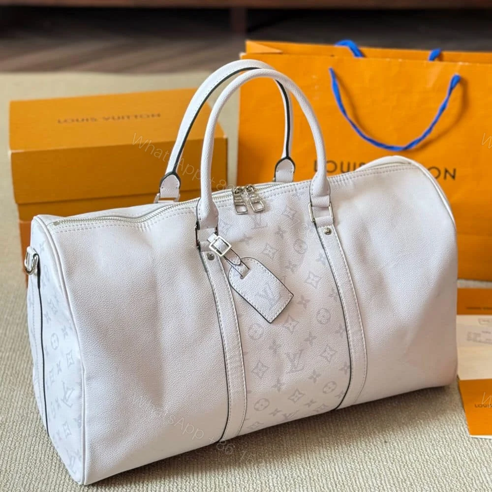 View 3 of Louis Vuitton Keepall 5 Bandouliere Optical White 40Cm M30885