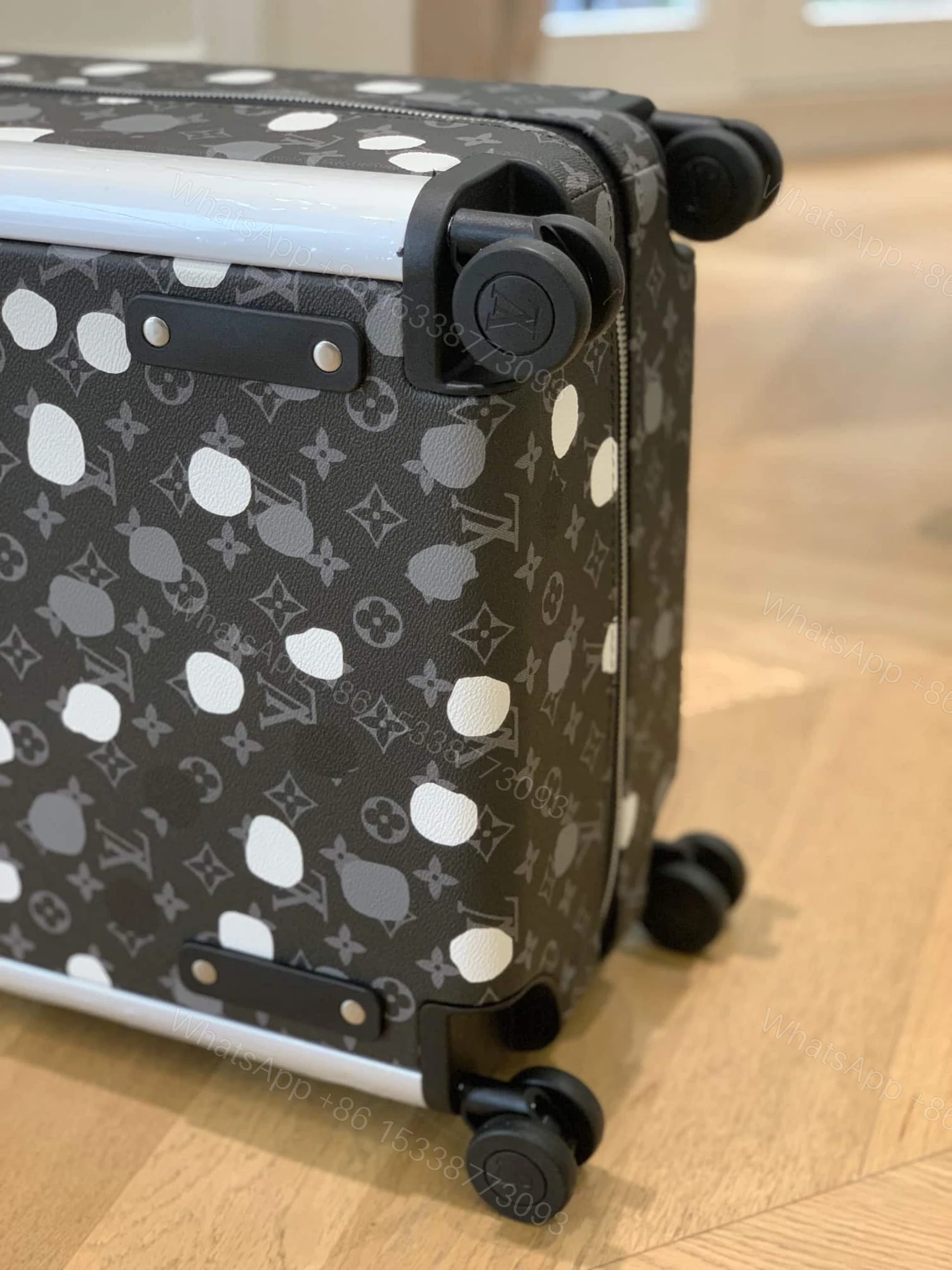 View 8 of Louis Vuitton X Yayoi Kusama Horizon 55 Suitcase Grained Leather Black 55Cm
