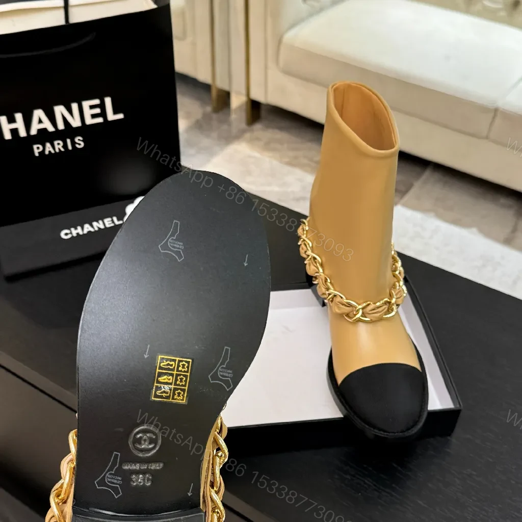 View 7 of Chic Tan Leather Boots with Black Toe Cap and Chain Detail