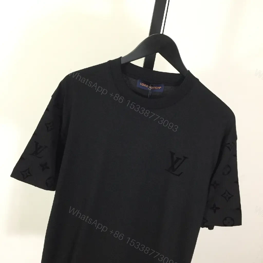 View 5 of Oversized Black Tee with Signature Embellishments — Modern Minimalism