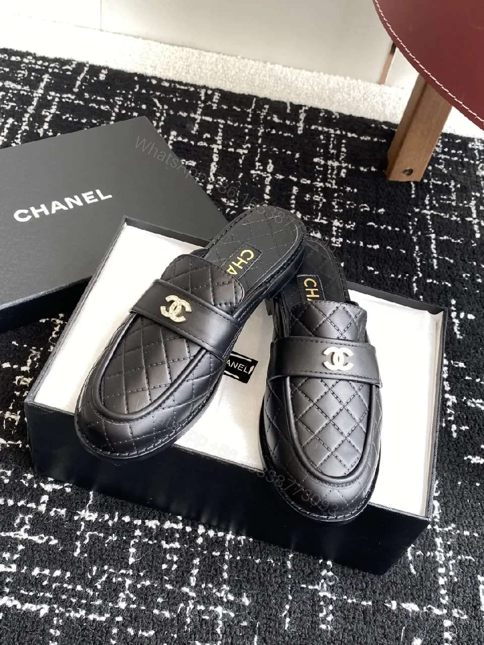 View 2 of Quilted Leather Mules with Gold Logo — Black, Premium Style