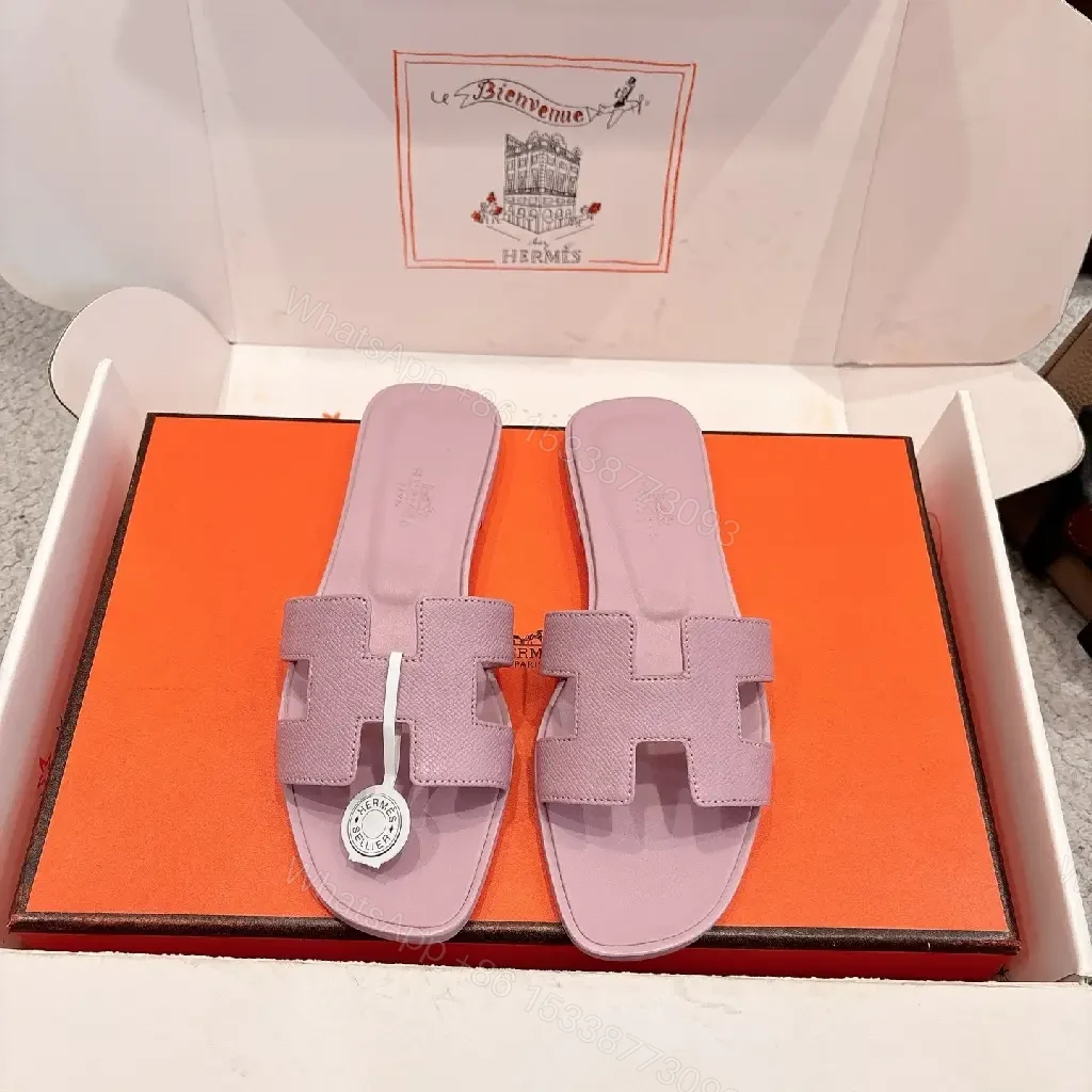 View 9 of Pastel Lavender Leather Sandals: Luxury Comfort Slide with H Motif