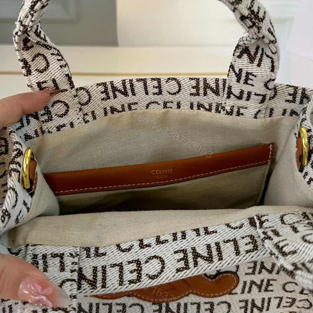View 8 of CELINE SMALL CABAS THAIS IN TEXTILE WITH CELINE ALL OVER WHITE 26CM