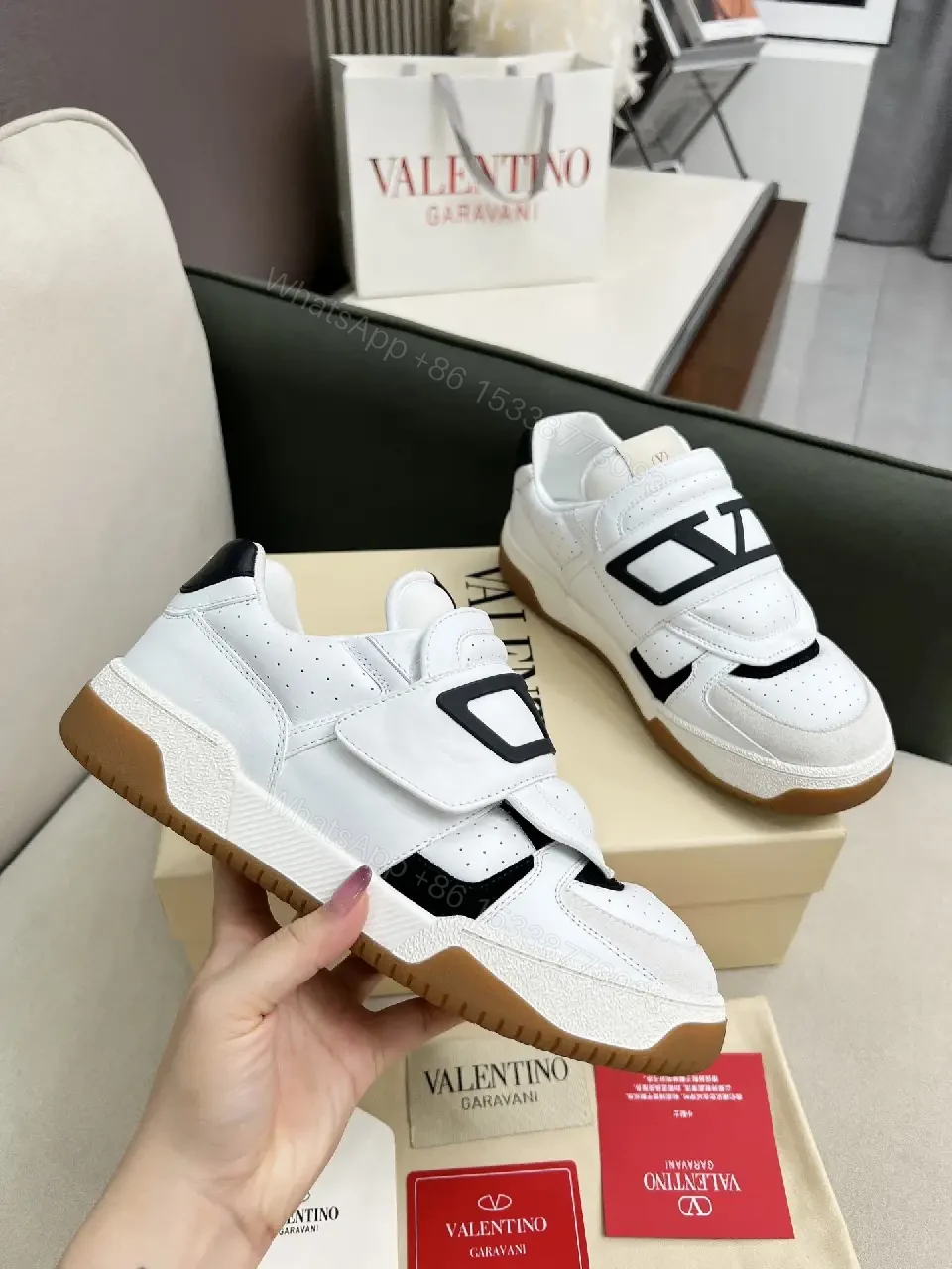 View 2 of White Leather High-Top Sneakers with Geometric Hardware