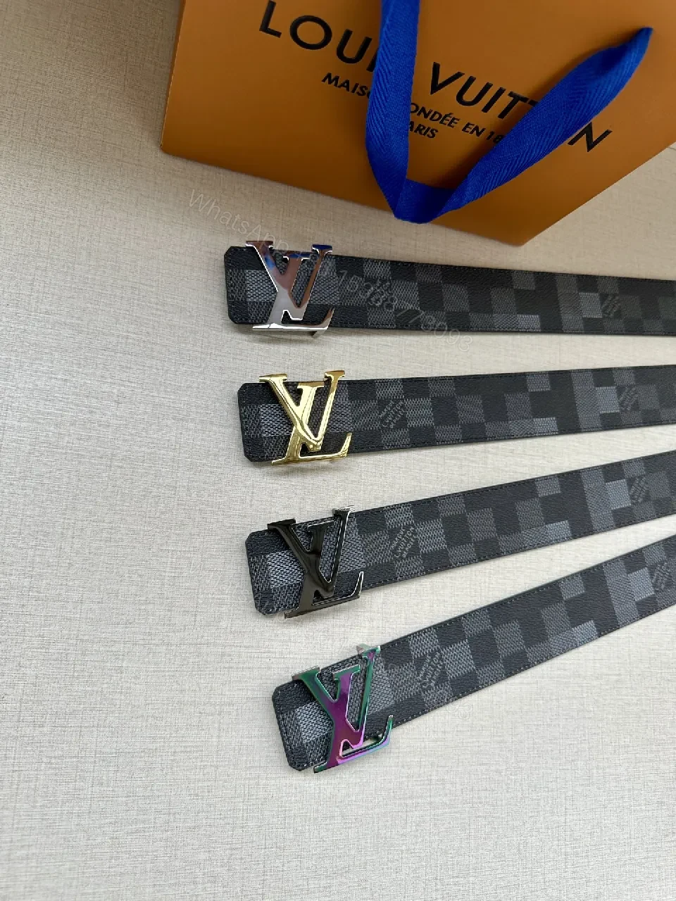 View 3 of Checkerboard Canvas Belt with Signature Buckle – Premium Modern Accessory