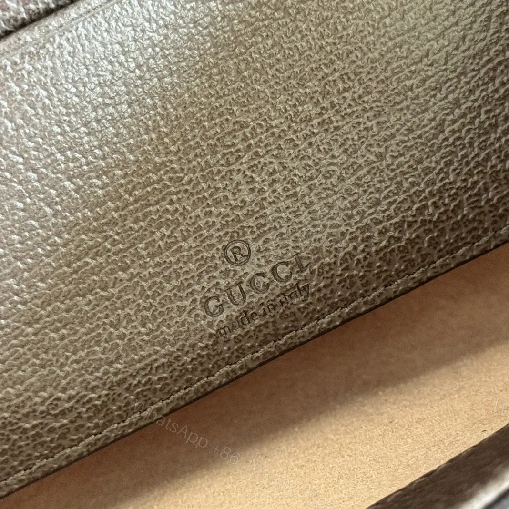 View 8 of Green Canvas Saddle Bag: Luxe Crossbody with Web Stripe and Gold Hardware