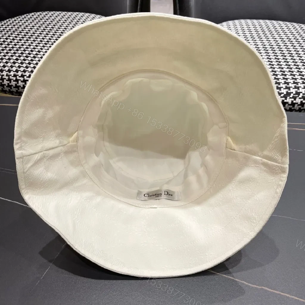 View 4 of Compact Luxury Bucket Hat with TriangleEmblem, Off-White, Textured Weave