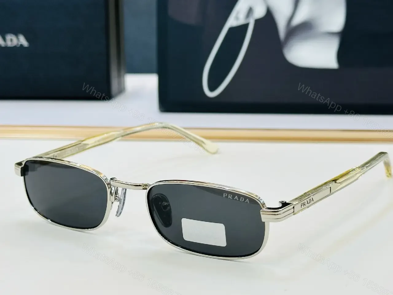 View 9 of Black Plastic/Acrylic Rectangular Semi-Rimless Narrow Metal Bridge Sunglasses