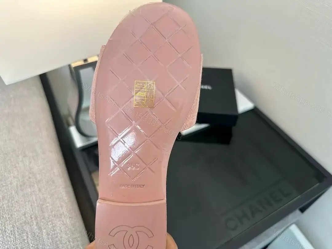 View 6 of Soft Pink Slip-On Sandals with Gold Logo – Luxury Comfort