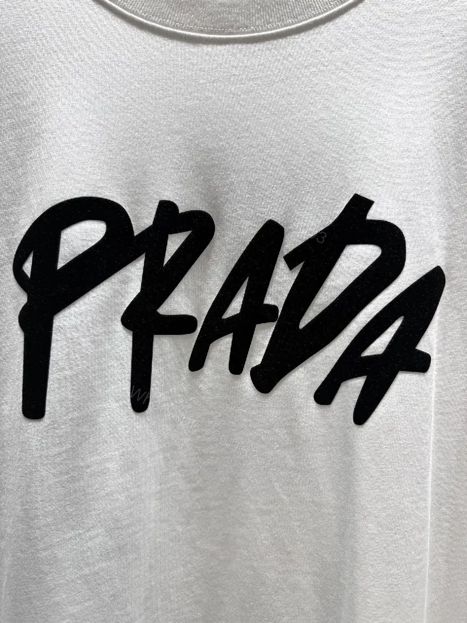 View 9 of Chic Bold Logo Cotton Tee – Modern Streetwear Fusion