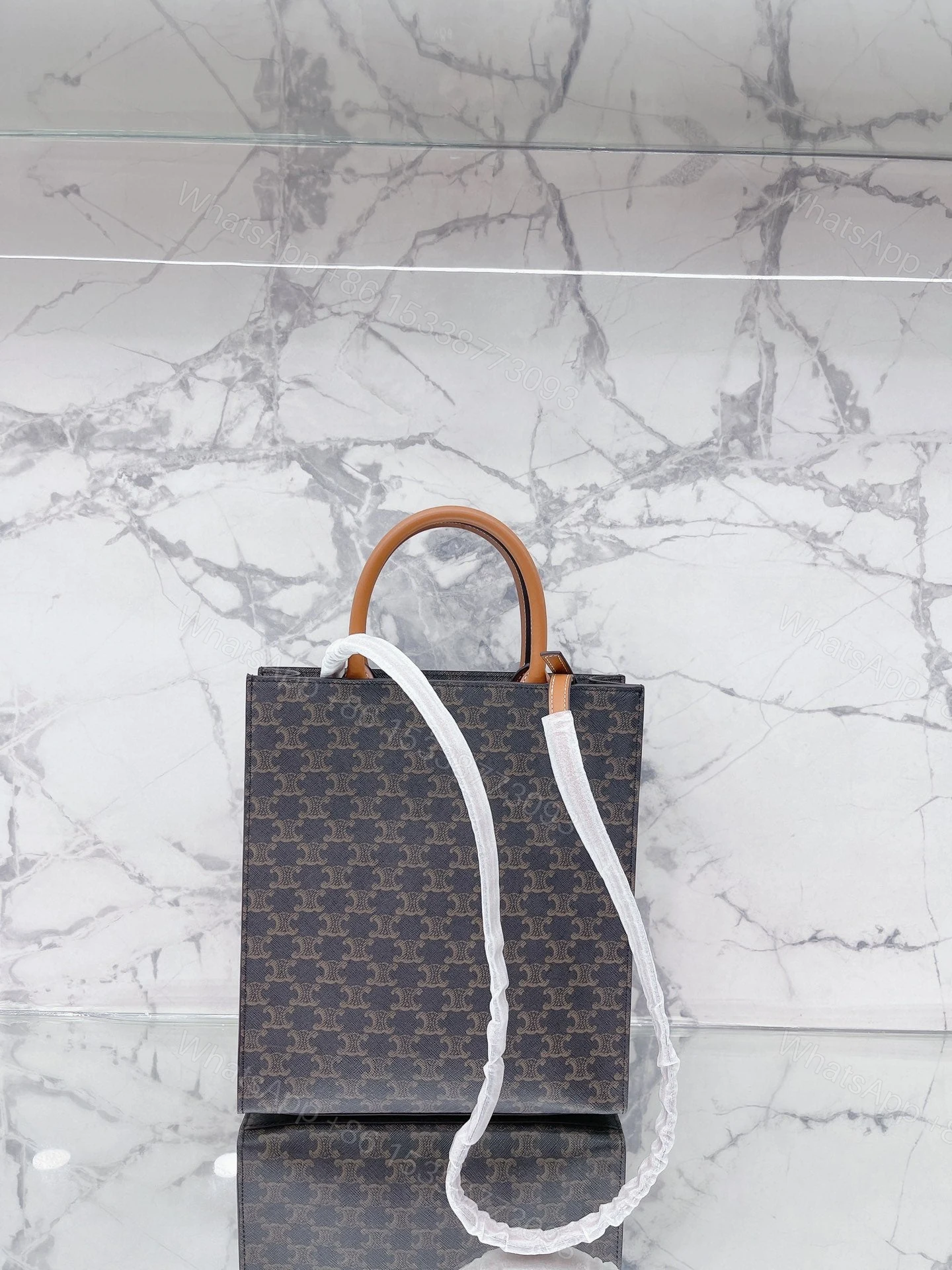 View 2 of CELINE MINI VERTICAL CABAS IN TRIOMPHE CANVAS AND CALFSKIN WITH PRINT 20CM 194372BZK04LU