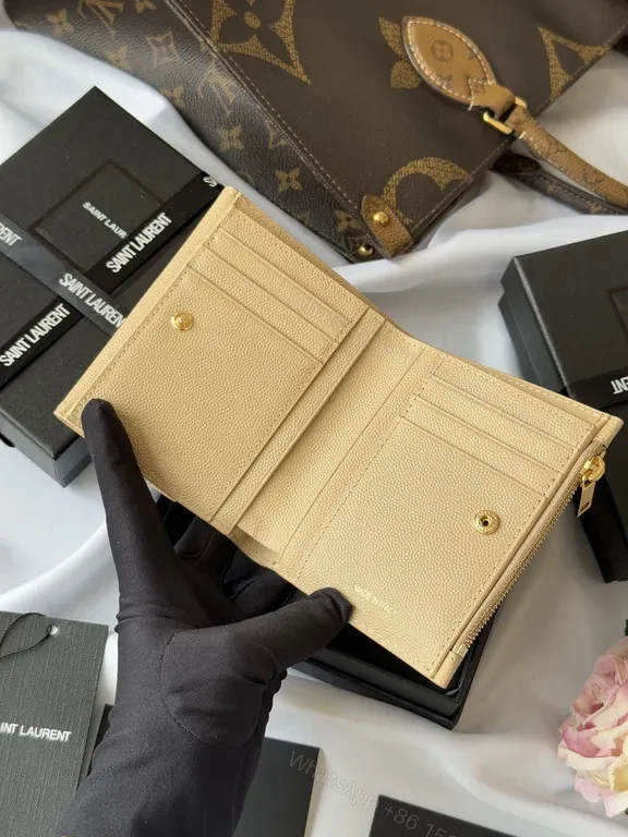 View 7 of Chic Nude Leather Wallet with Gold Hardware - Compact Luxury