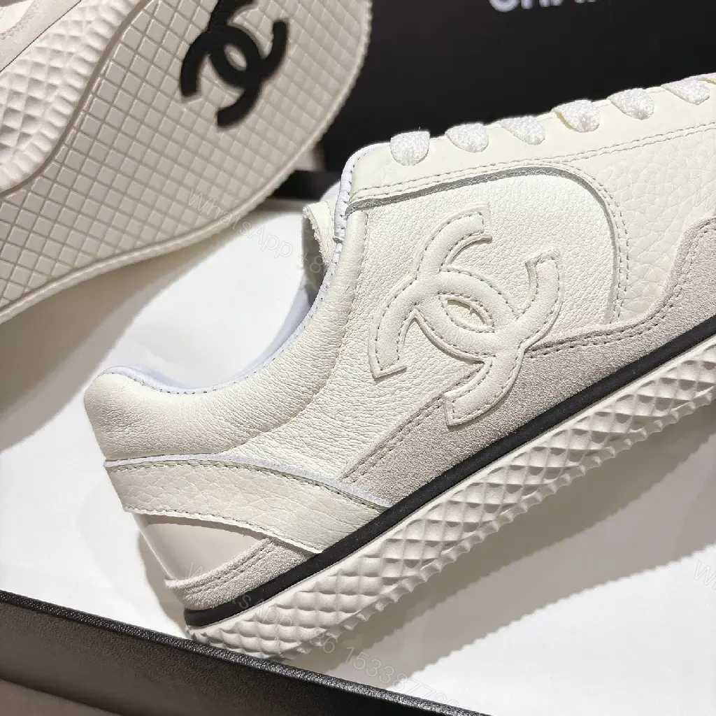View 8 of Cream Leather-Texture Sneaker with Signature Emblem, Modern Couture Style