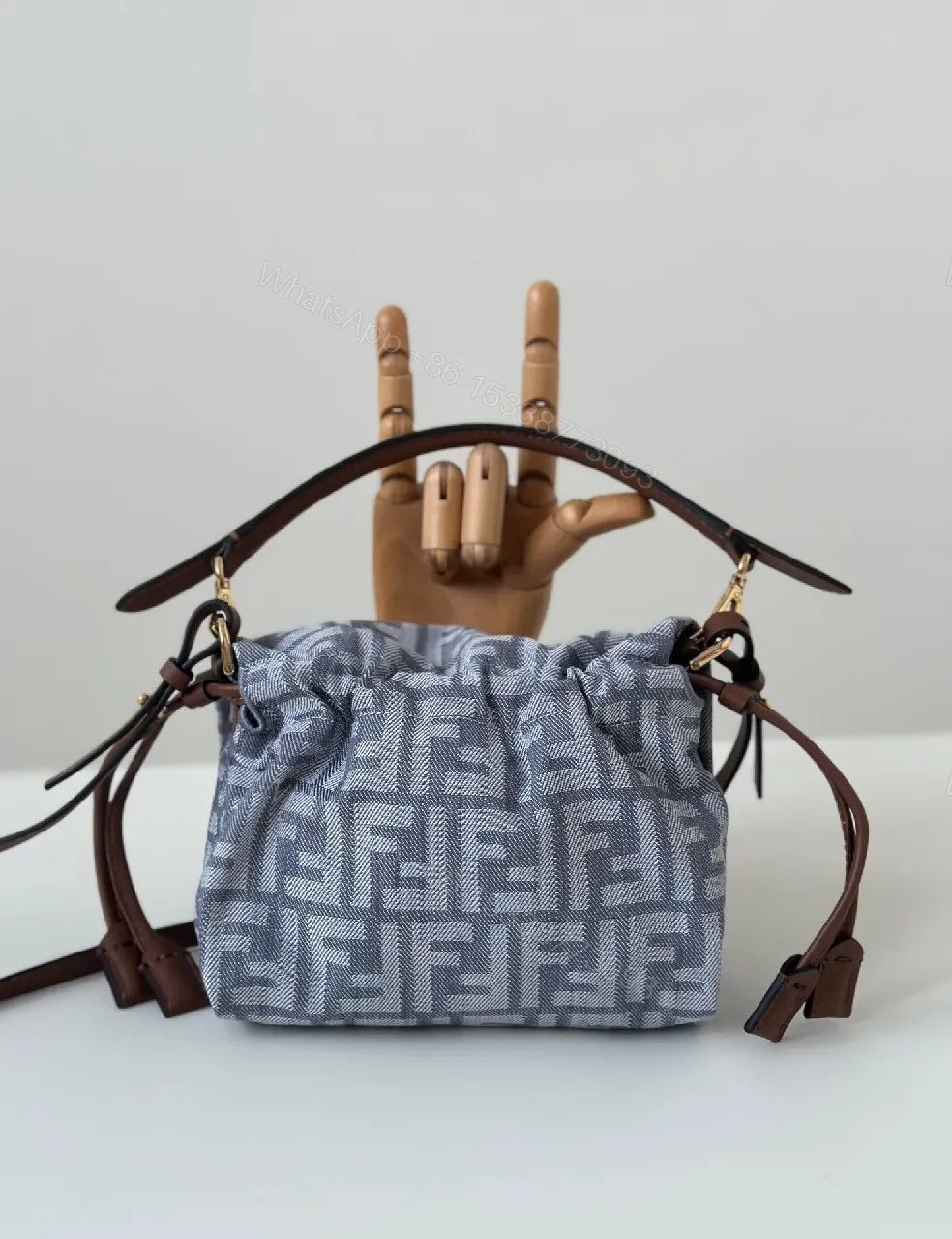 View 2 of Lux Monogram Sling Bag: Gold Hardware, Leather Trim, All-Season Style