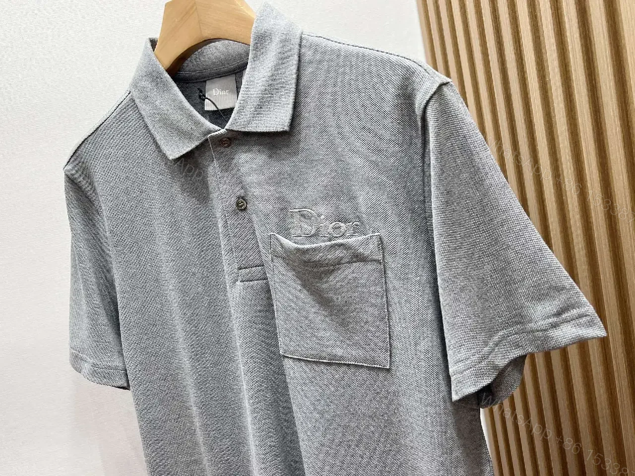 View 3 of Minimalist White Cotton Polo with Subtle Detailing