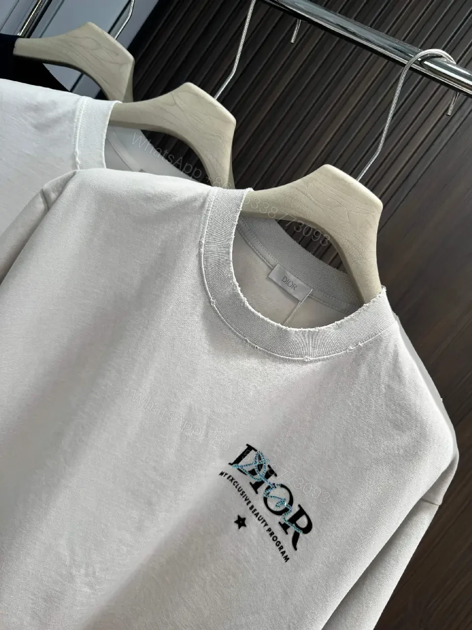 View 9 of Minimalist Logo Tee: Elevated Everyday Comfort, Off-White, Cotton Blend, Relaxed Fit, Short Sleeve Tee