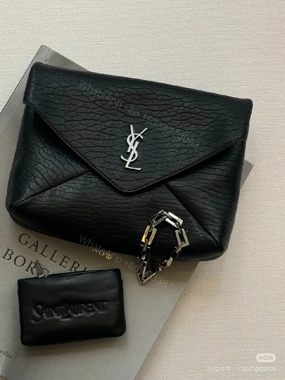 View 2 of Black Textured Leather Envelope Bag – Minimal Logo, Compact & Versatile
