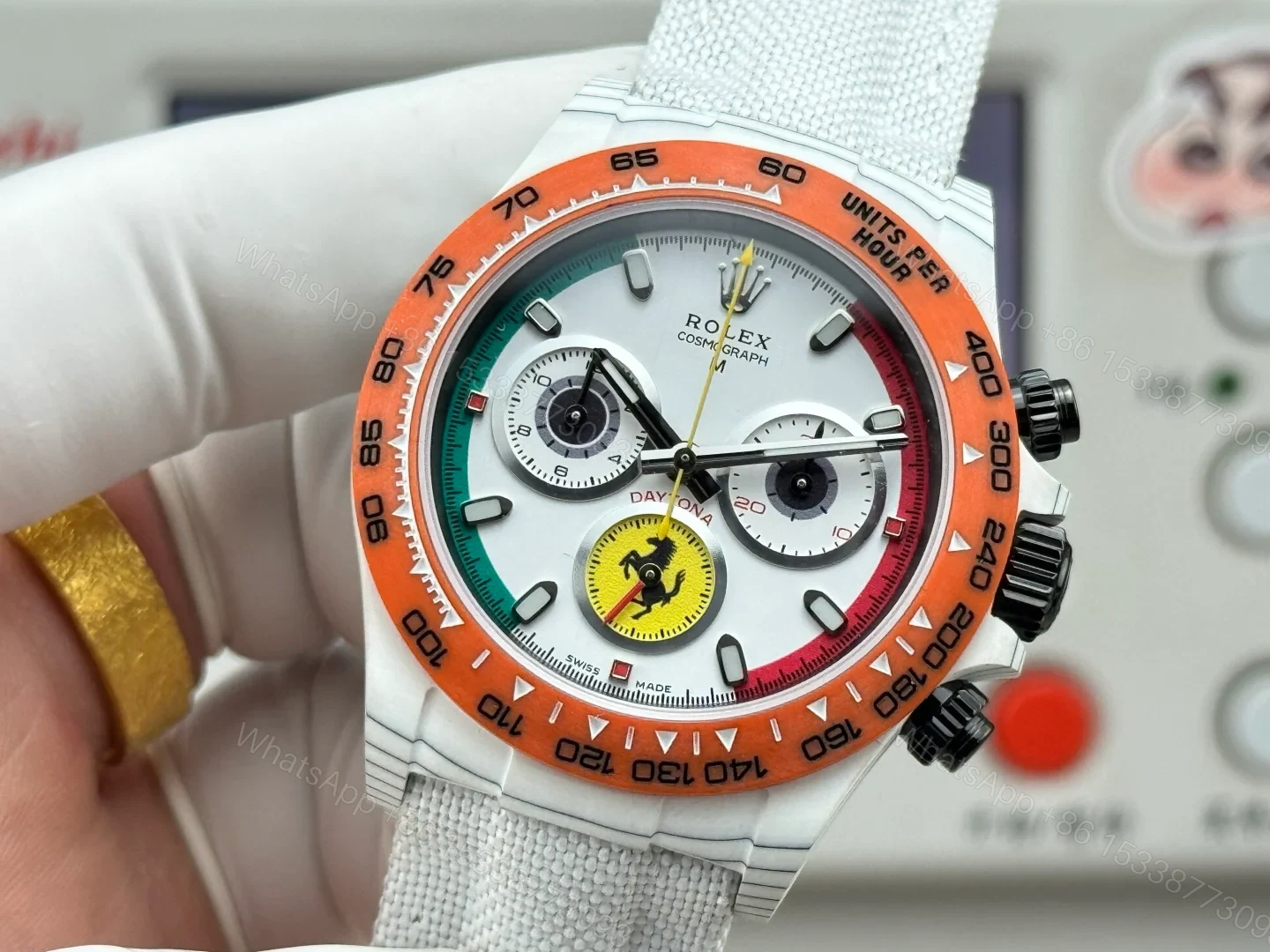 View 5 of Rolex Daytona Carbon Fiber White Replica 40MM Exclusive Orange Bezel White Fabric Strap R74 RG-ROLEX-DAYTONA-WHITE-DIAL