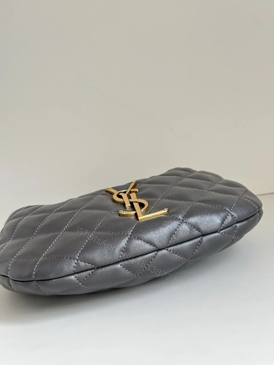 View 3 of Quilted Mini Bag with Gold Logo – Elegant Everyday Carry