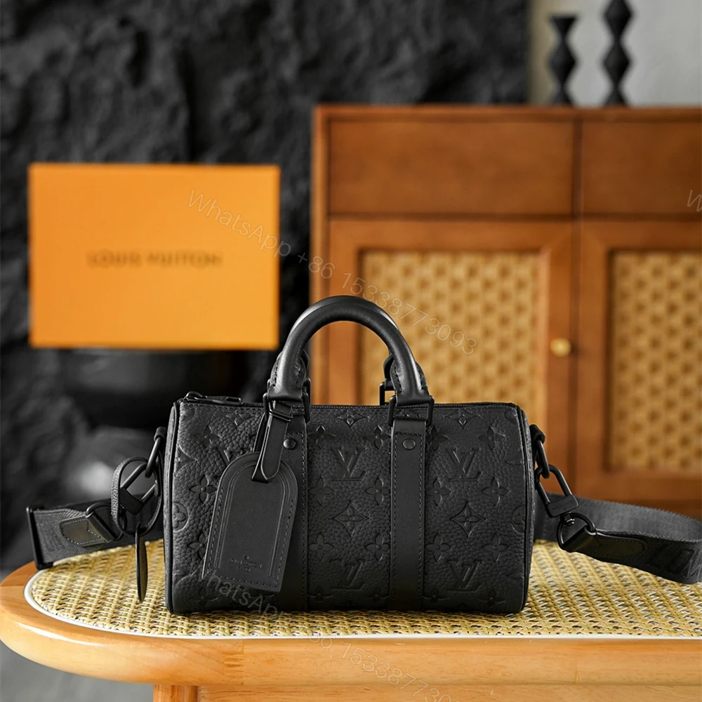高仿LV*Keepall25系列M20900壓紋牛皮男士單肩包黑色免檢版 — view 1