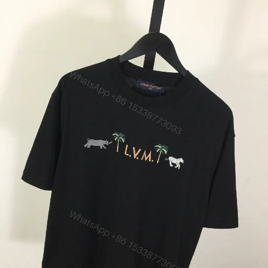 View 9 of Black Cotton Blend Palm Monogram Tee - Elevated Casual Staple