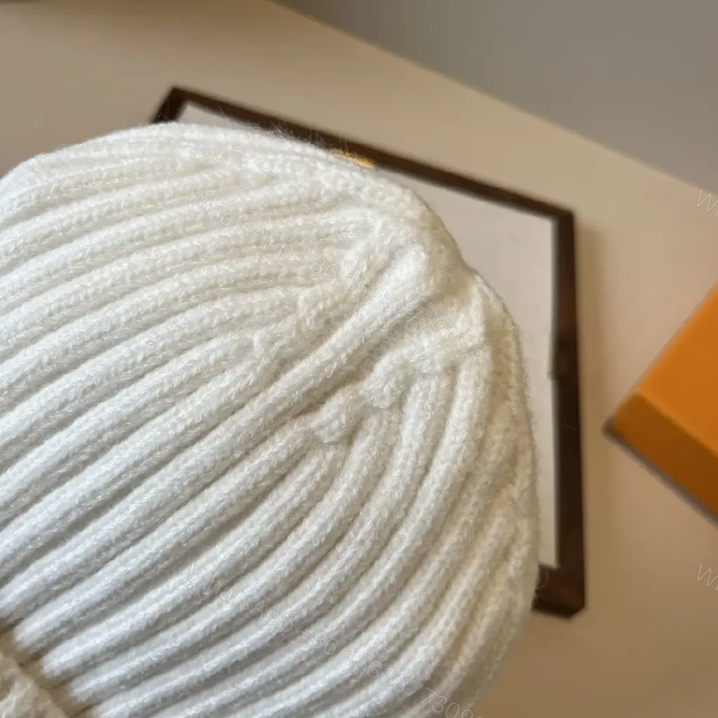 View 7 of Neutral Ivory Knit Beanie with Premium Embroidery Warmth
