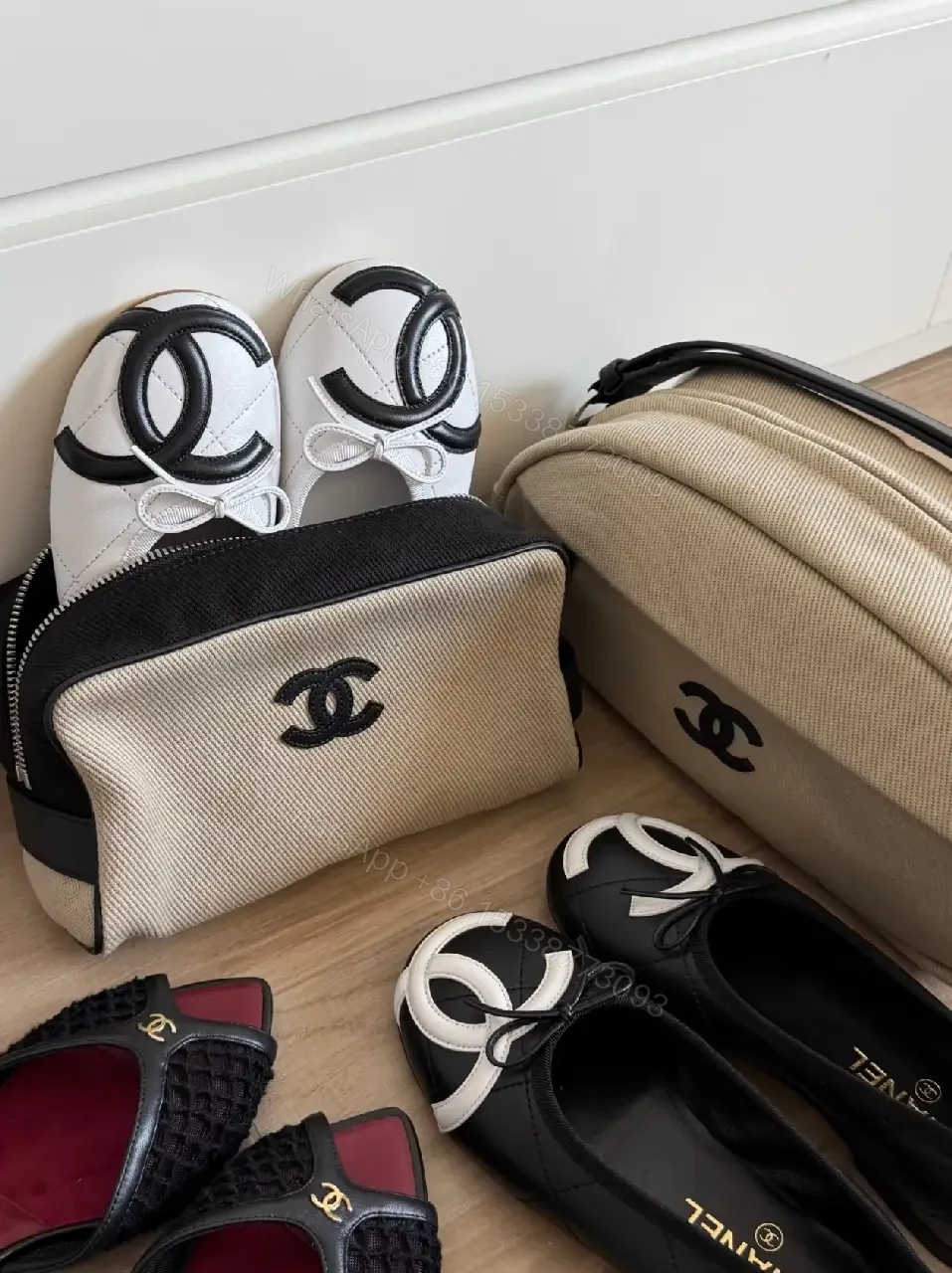View 2 of Beige Canvas Pouch - Black Trim, Logo, Wrist Strap, Compact