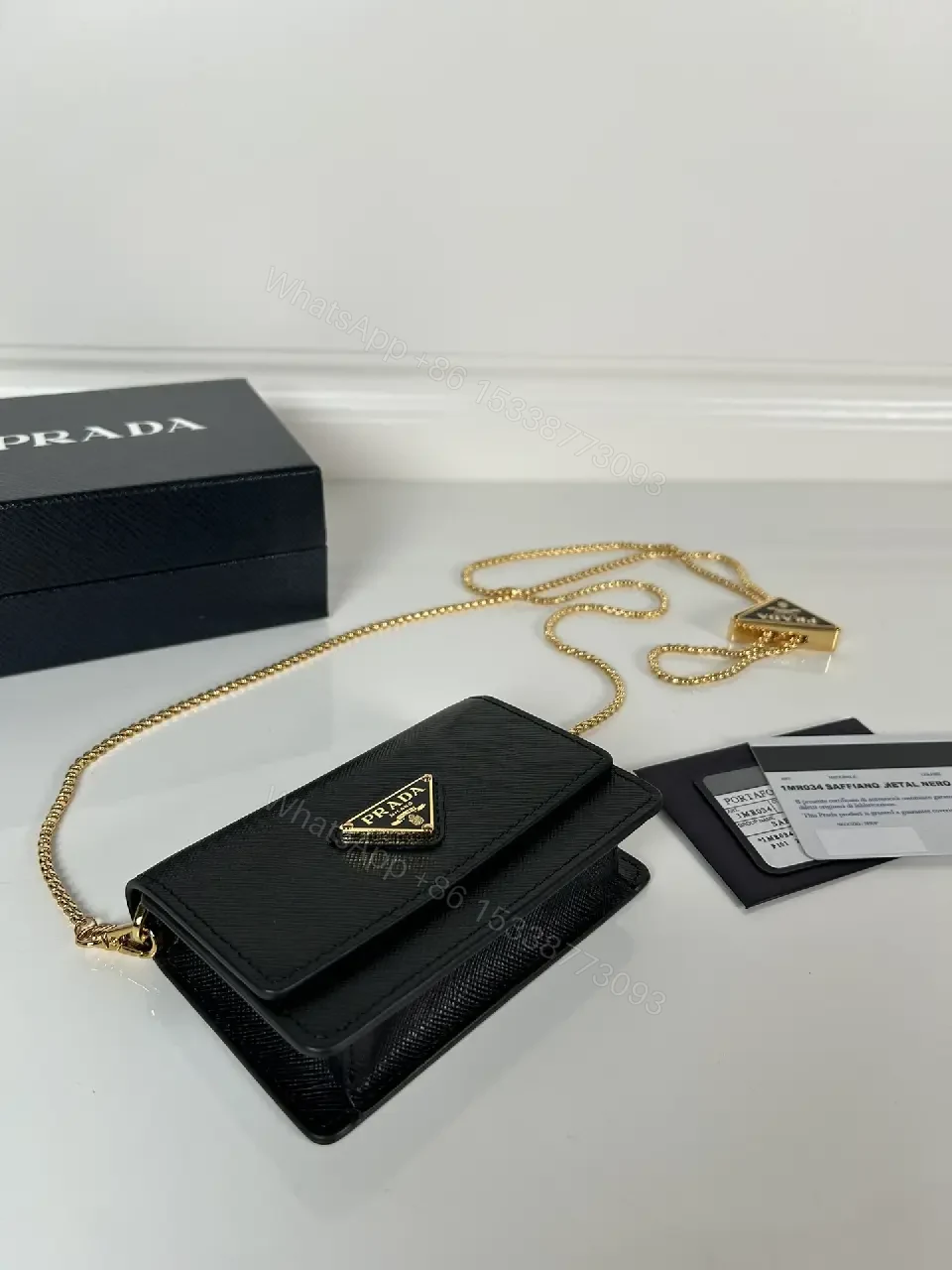 View 3 of Compact Crossbody Bag: Black Leather, Gold Chain, Minimalist Luxe