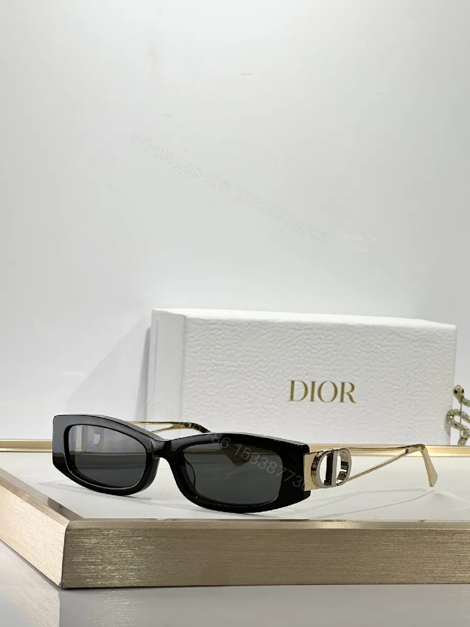 View 8 of White Rectangular Sunglasses with Dior-Gold Accents: Modern Luxury Sideways
