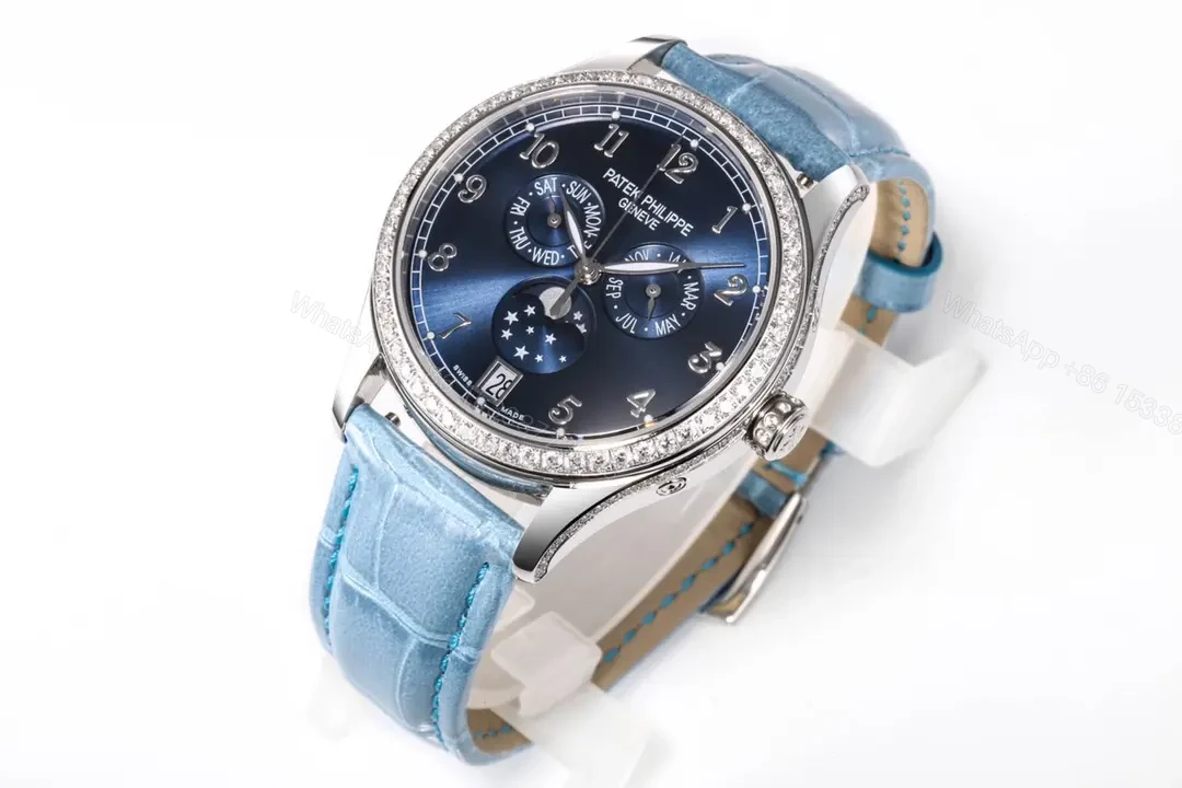 View 2 of Patek Philippe Complications Collection Annual Calendar Moon Phase Women’s Watch in Blue with Diamond Set Case 38mm Italian Leather Strap