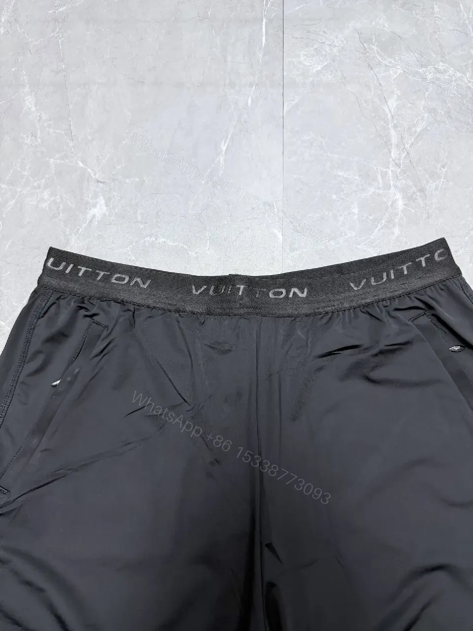 View 3 of Sporty Luxe Black Shorts with Subtle Luxury Details