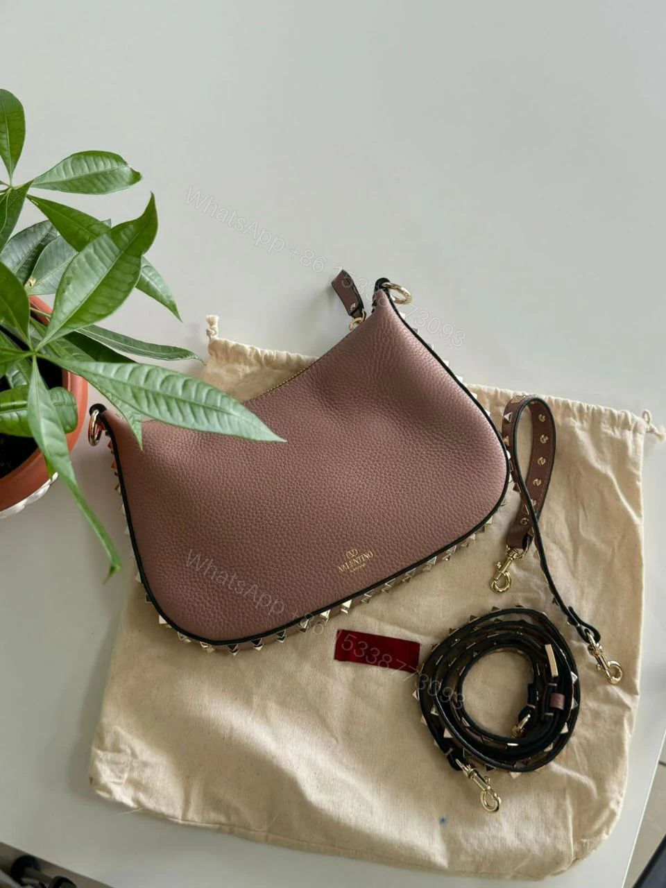 View 2 of Valentino Garavani Small hobo bag made of leather “Rockstud