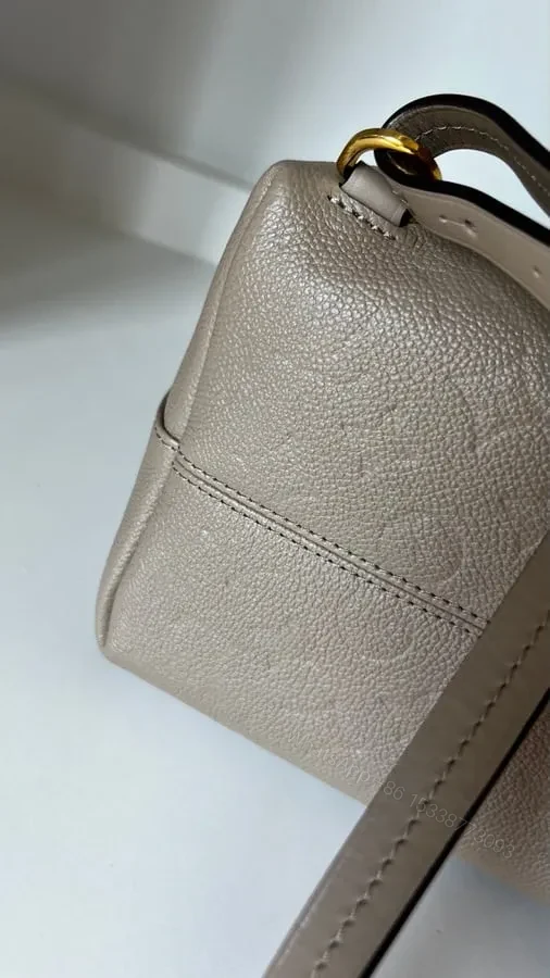 View 7 of LOUIS VUITTON Monogram Empreinte Montsouris PM Backpack Replica