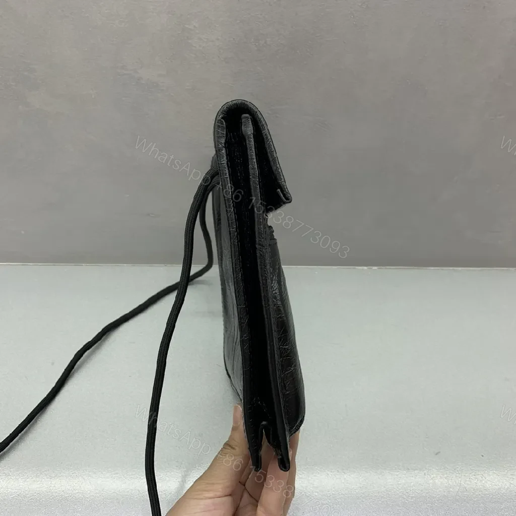 View 8 of Compact Black Leather Crossbody: Modern Texture, Ultra-Functional