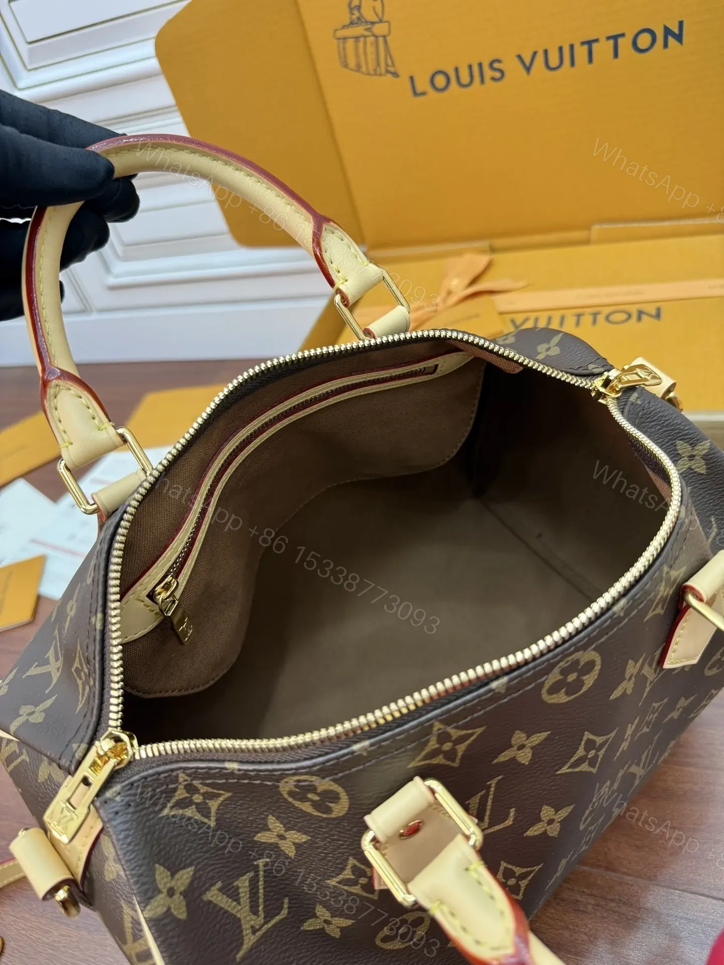 View 4 of Louis Vuitton Speedy Bandoulière 25 Handbag in Monogram