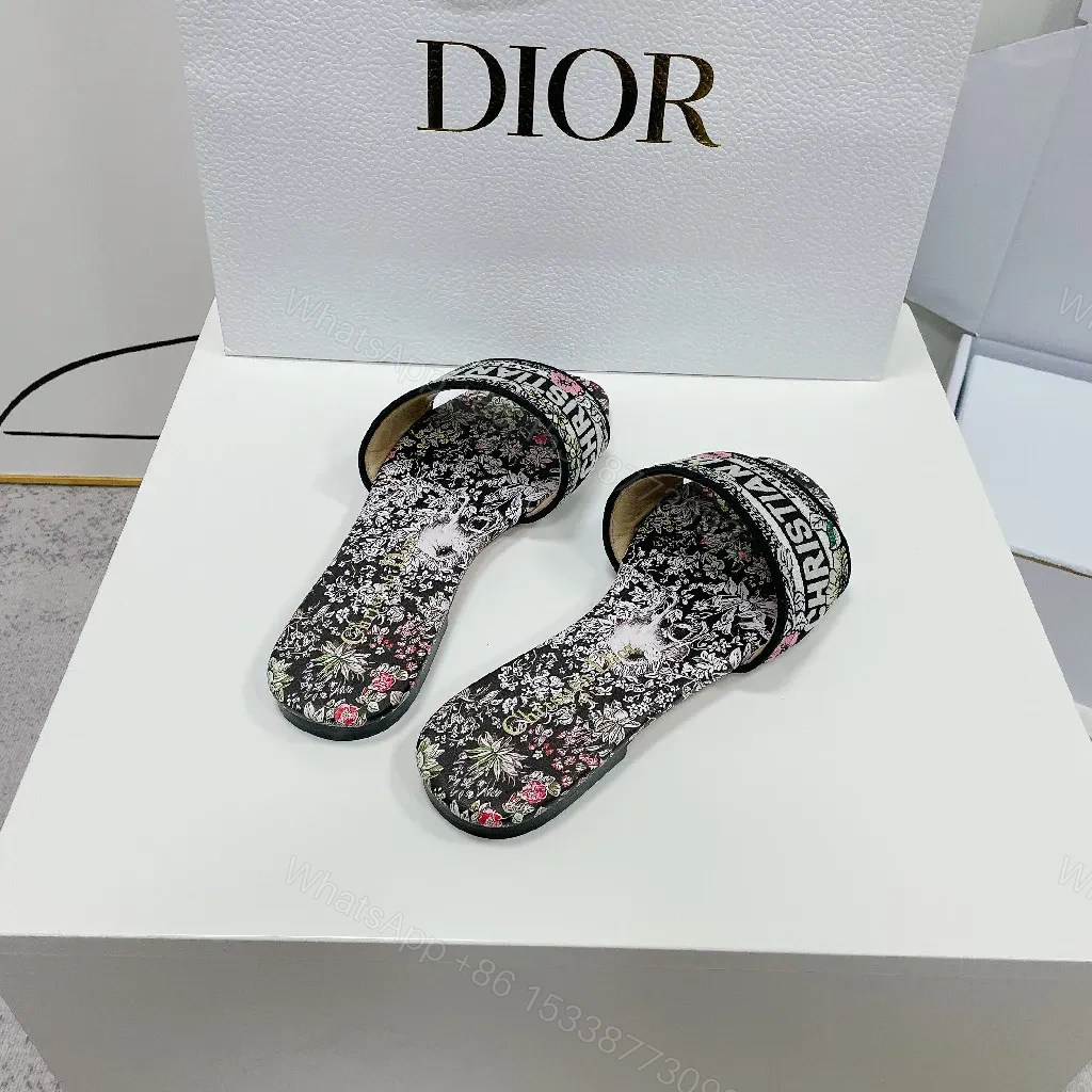 View 4 of Floral-Print Slides in Black with Signature Dior Strap