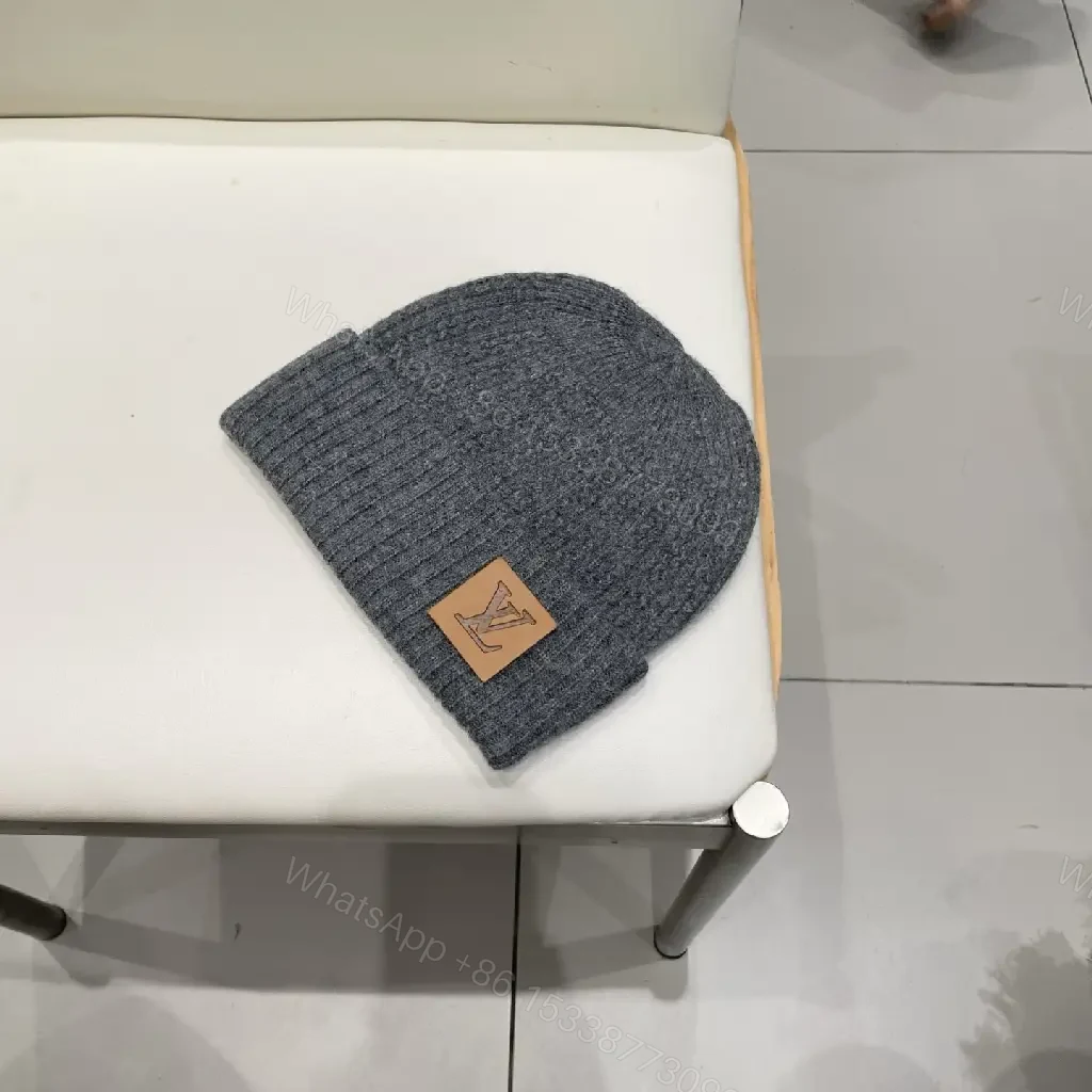 View 4 of Charcoal Knit Beanie with Leather Patch – Subtle Luxury Everyday