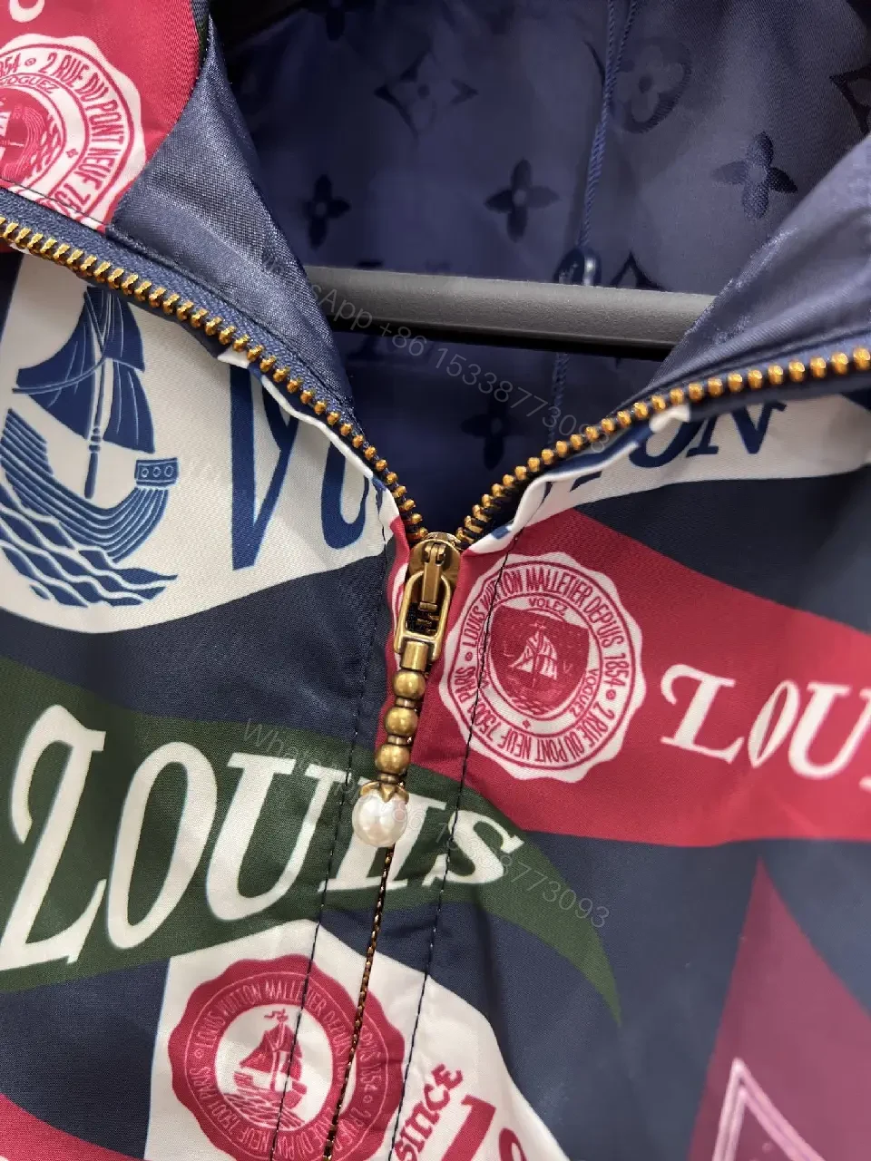 View 9 of Bold Patterned Zip Jacket: Logo Motif Luxury Streetwear