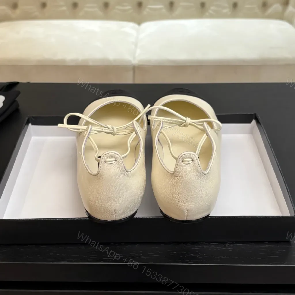 View 8 of Ivory Leather Ballet Flats with Black Cap Toe, Lace-Up, Elegant