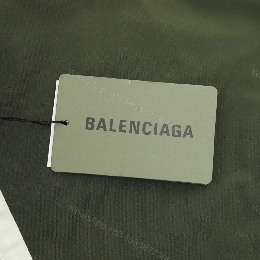 View 6 of Olive Pave Coach Jacket: Subtle Stride, Bold Presence