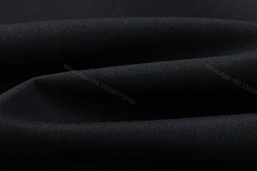 View 3 of Cozy Black Nylon Parka: Minimalist, Weatherproof, Modern Simplicity