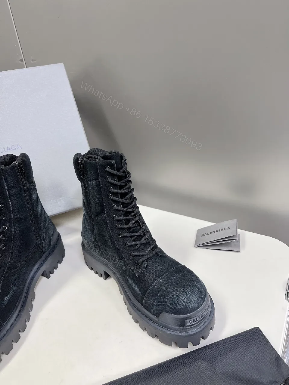 View 2 of Bold Black Combat Boots with Rugged Texture