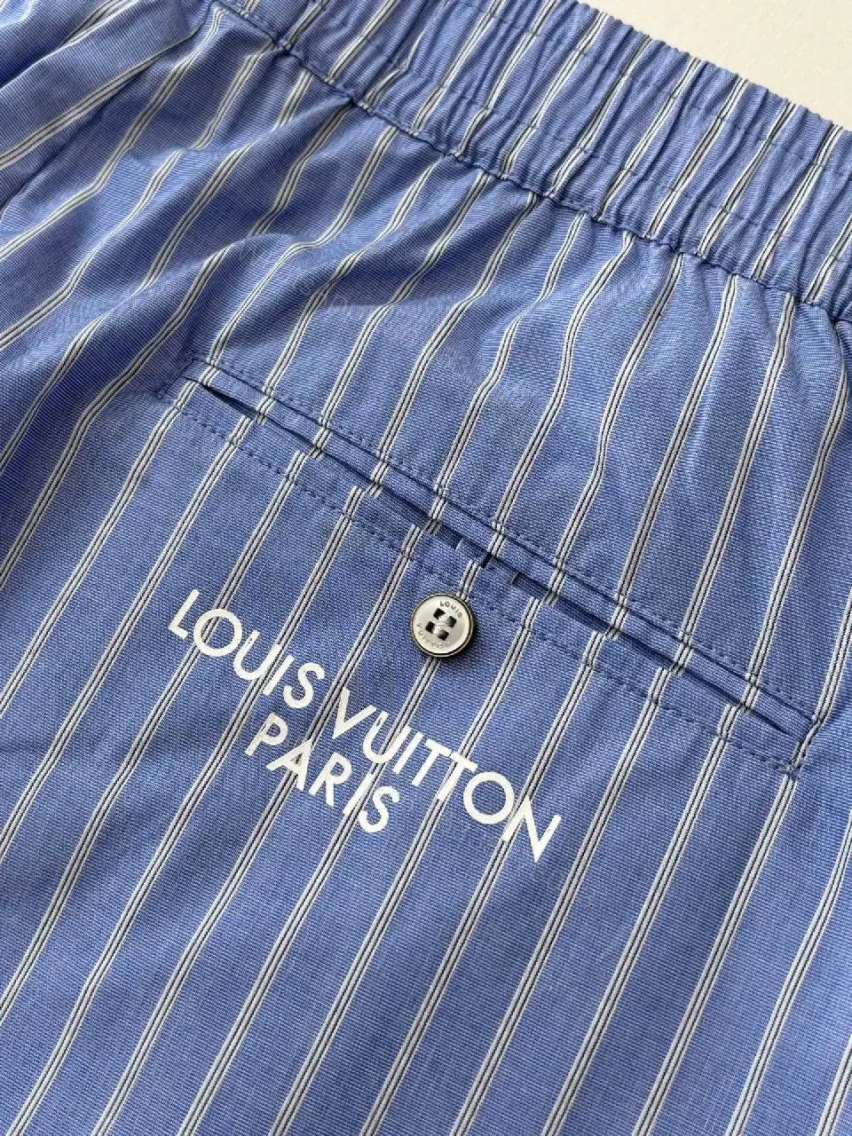 View 7 of Blue Striped Lightweight Drawstring Shorts - Subtle Embossed Logo Luxury