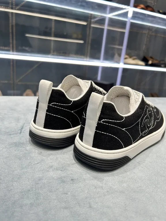 View 2 of Black & White Chanel-Style Low-Top Sneakers: Everyday Luxury